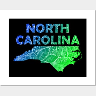 Colorful mandala art map of North Carolina with text in blue and green Posters and Art